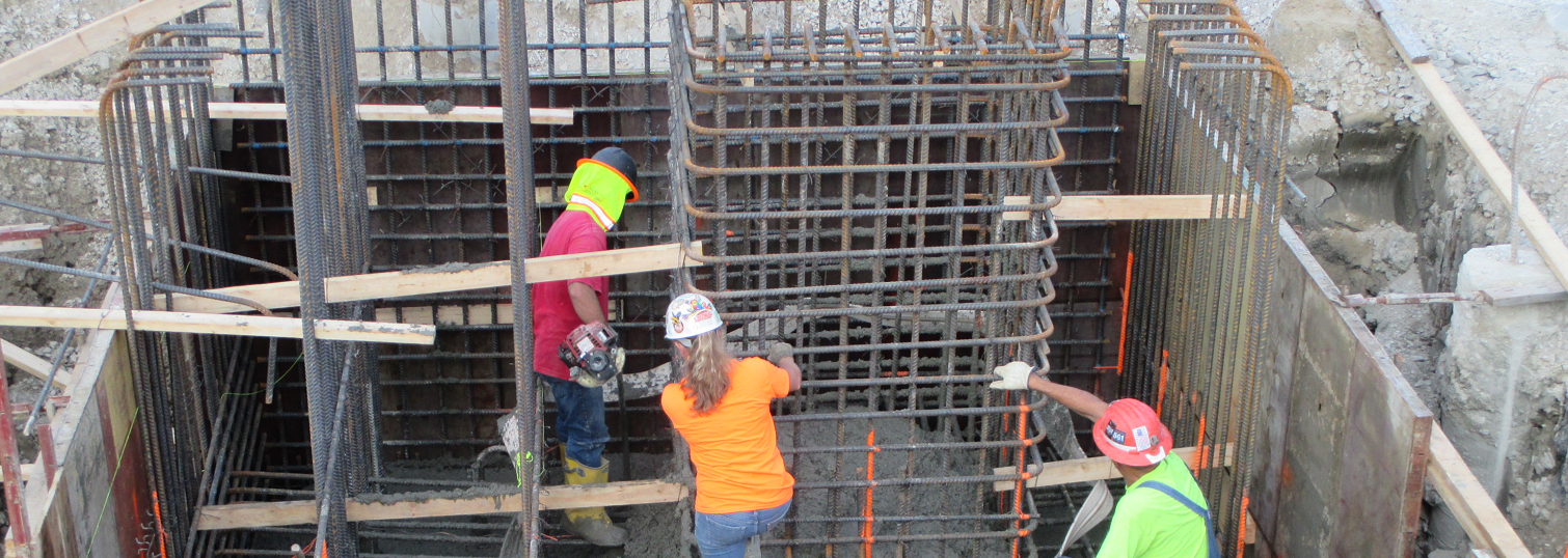 maintenance workers working on construction of a building